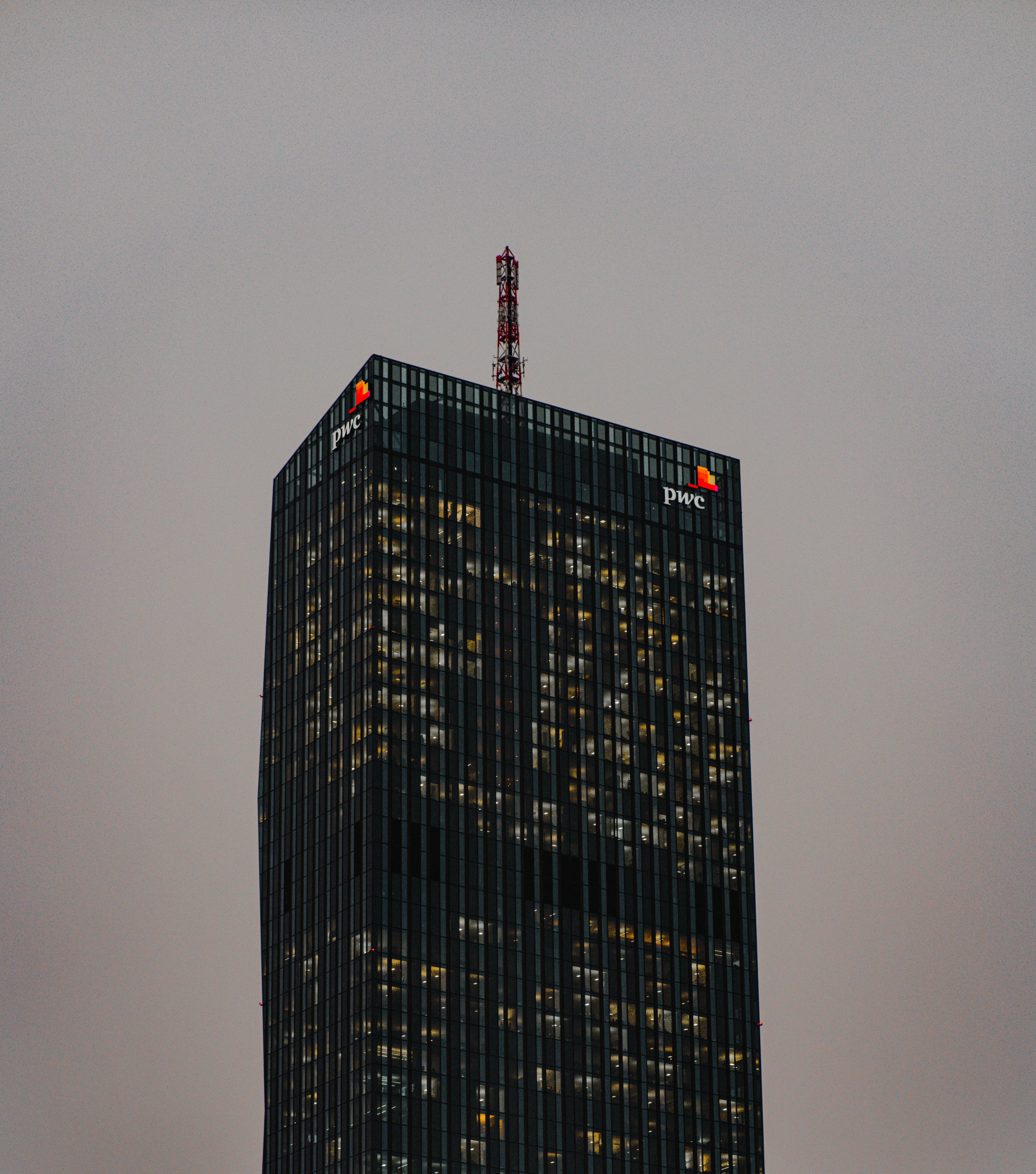 black high rise building during night time